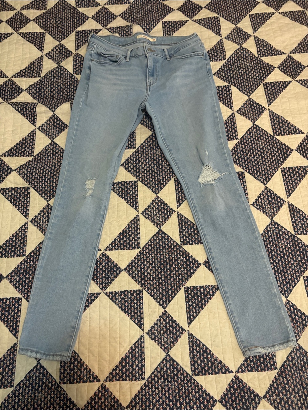 Levi's Light Blue Skinny Jeans with Knee Distress